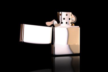 Iron lighter on a black background clipart