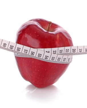Kırmızı elma ve bir ölçü bandı, diyet kavramı