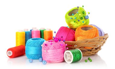 Thread bobbins and wool bals isolated on white clipart