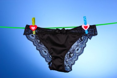 Woman's panties hanging clipart