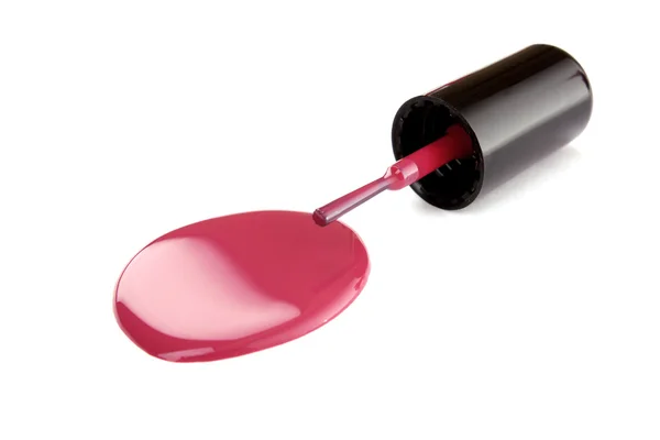 Różowy lakier do paznokci na białym tle — Zdjęcie stockowe