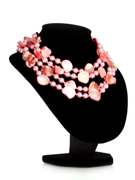 Le perle su un manichino isolato su bianco — Foto Stock