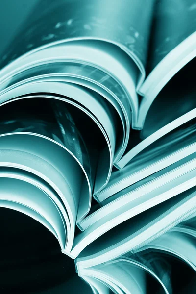 Magazine on blue background — Stock Photo, Image