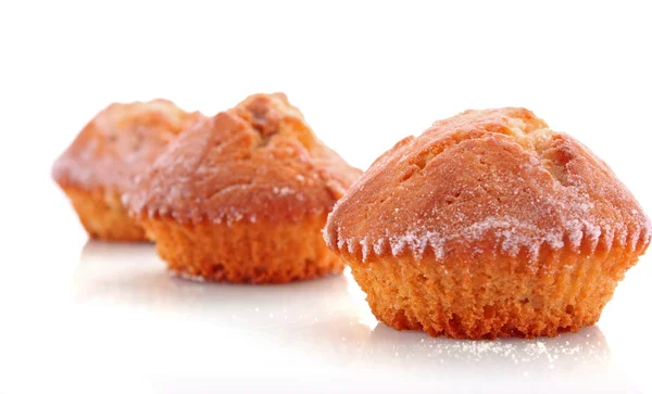 Tre cupcake su sfondo bianco — Foto Stock
