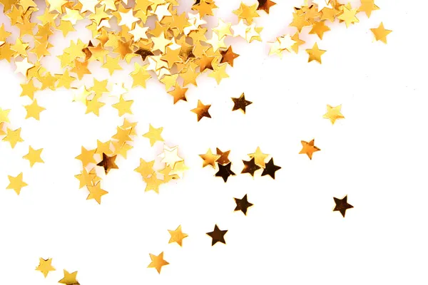 Estrelas douradas na forma de confete em branco — Fotografia de Stock