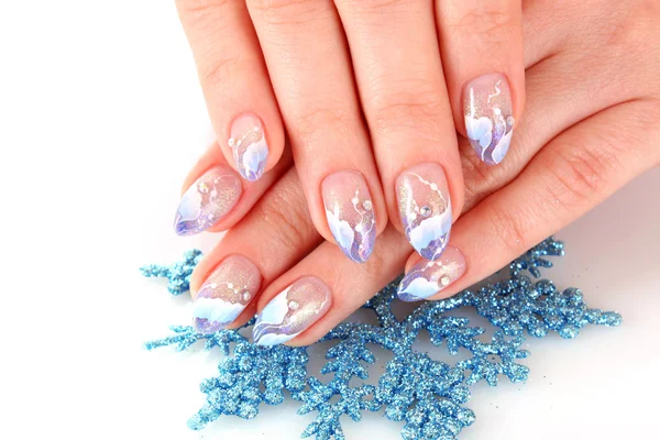 Nails with beautiful winter design on white — Stock Photo, Image