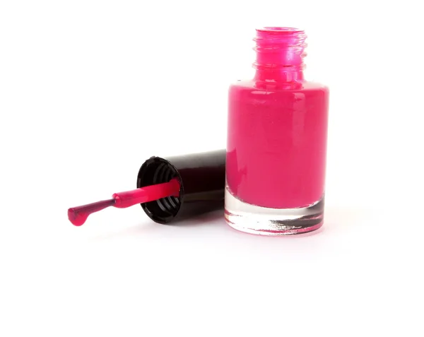 Růžový lak na nehty na bílém pozadí — Stock fotografie