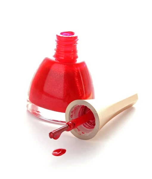 Spilled Red Nail Polish with brush — Stock Photo, Image