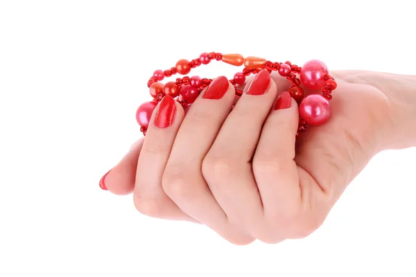 Två händer med den röda manikyr, isolerade — Stockfoto
