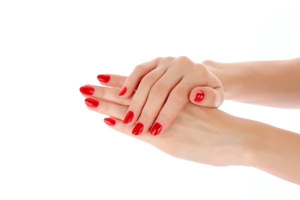 Duas mãos com a manicura vermelha, isolado — Fotografia de Stock