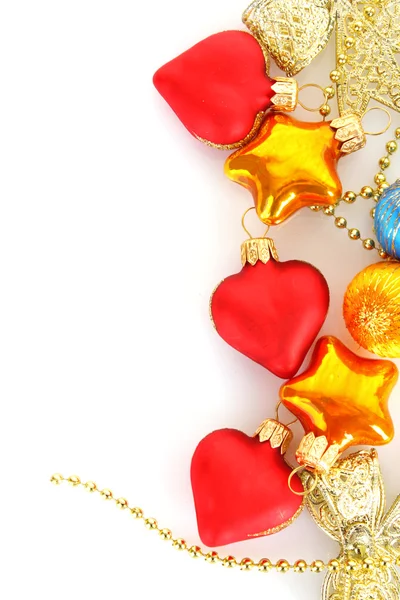 Brinquedos de Natal com ouro vermelho no fundo branco — Fotografia de Stock