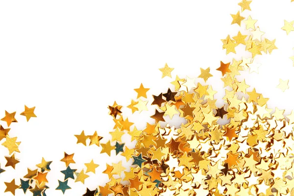Goldene Sterne in Form von Konfetti auf weißem Grund — Stockfoto
