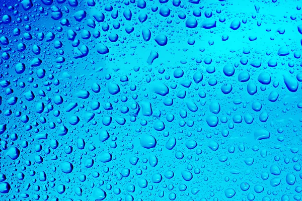 Agua azul gotas fondo — Foto de Stock