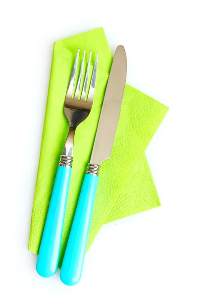 Knife and fork on a napkin isolated on white — Stock Photo, Image