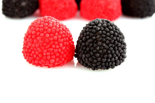 Red and black candy berries — Stock Photo, Image