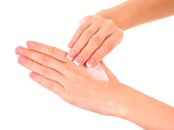 Nahaufnahme schöner weiblicher Hände, die Handcreme isoliert auf weißem Bac auftragen — Stockfoto