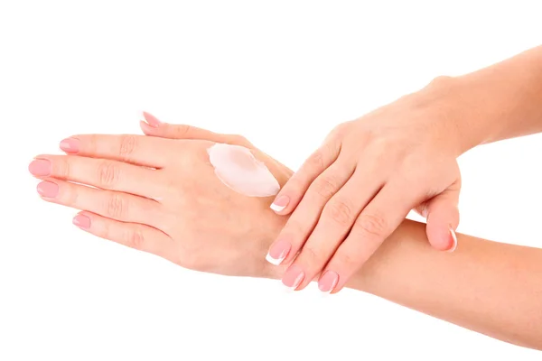 Close-up van mooie vrouwelijke handen toepassing hand crème geïsoleerde o — Stockfoto