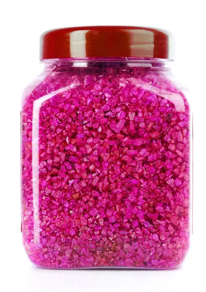 Červené aromatické koupelová sůl v láhvi izolovaných na bílém — Stock fotografie