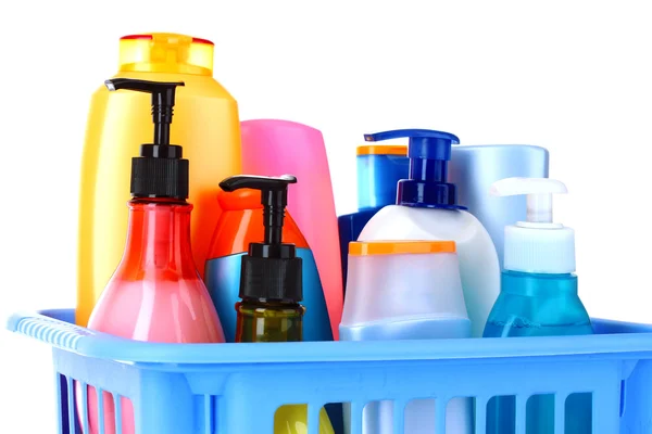 Bottles of beauty and bath products in blue box — Stock Photo, Image