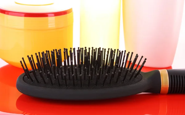Big black comb on yellow background — Stock Photo, Image