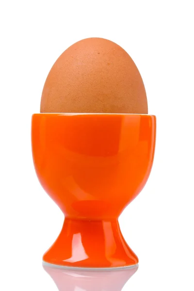 Kokt ägg i orange stå — Stockfoto