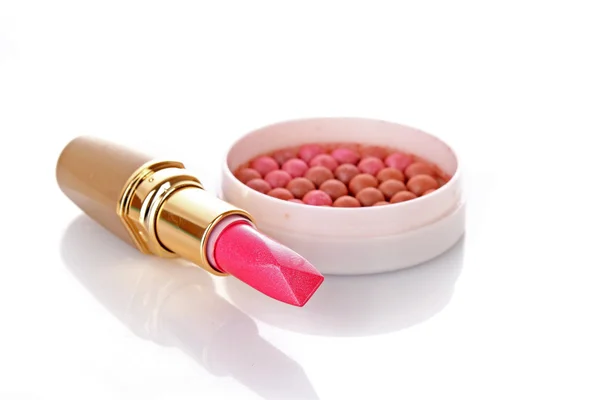 stock image New lipstick and pink rouge on white background