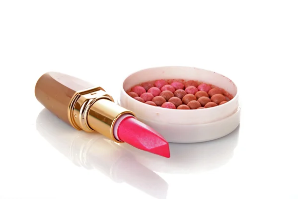 New lipstick and pink rouge on white background — Stock Photo, Image
