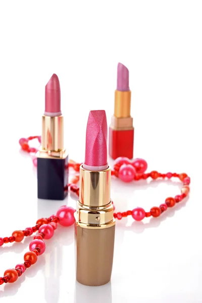 Three lipsticks on white background — Stock Photo, Image