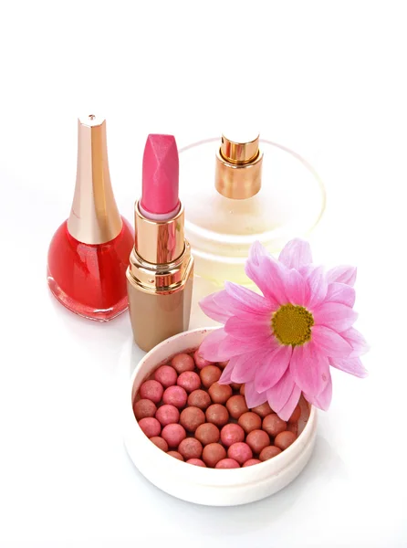 stock image Many colourful woman cosmetics with flower on white white back