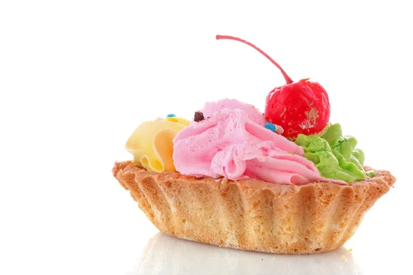 Pink cheesecake with maraschino cherry on white — Stock Photo, Image