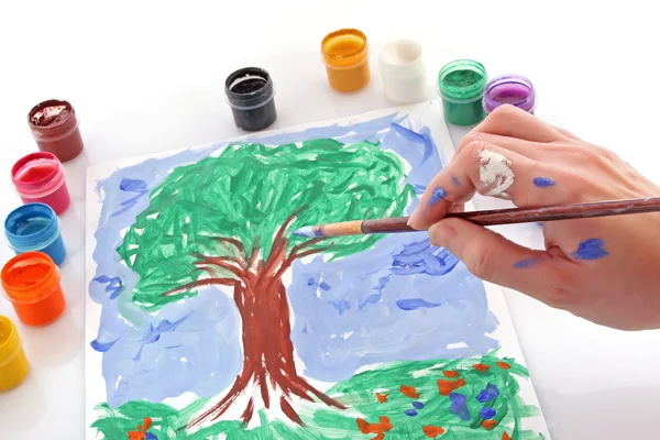 Opened paint buckets colors and drawing tree — Stock Photo, Image