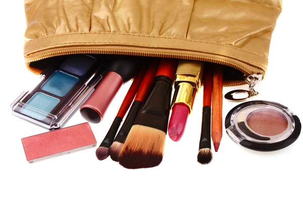 Cosmetics bag with cosmetic on white — Stock Photo, Image