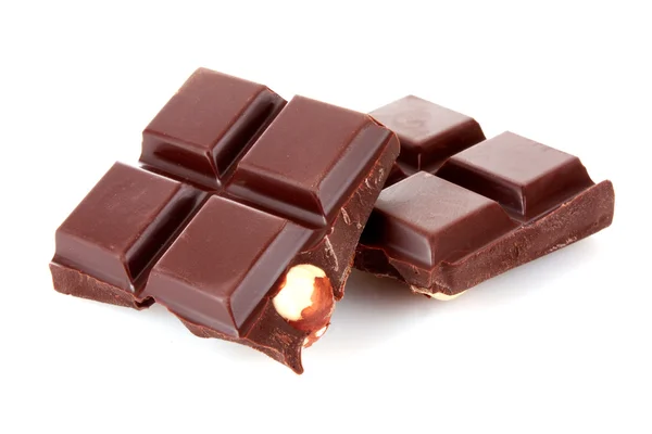 Choklad bitar på vit bakgrund — Stockfoto