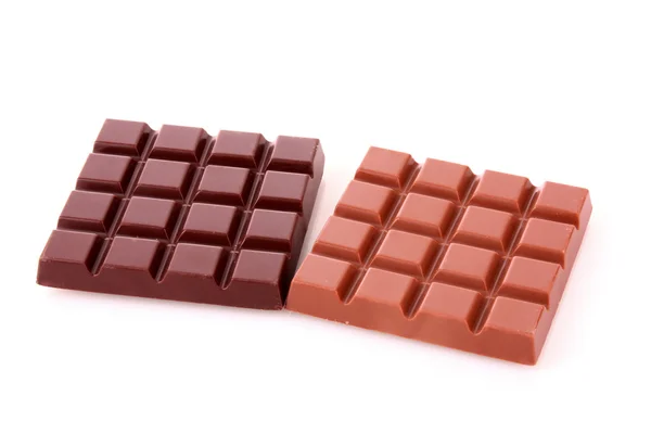 Leche y barras de chocolate negro — Foto de Stock