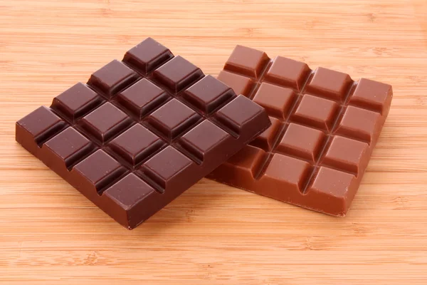 Mléko a černé čokolády — Stock fotografie
