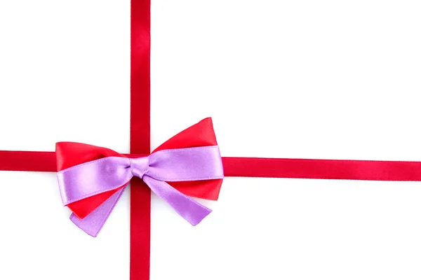 Gift red ribbon and bow isolated on white background Stock Photo
