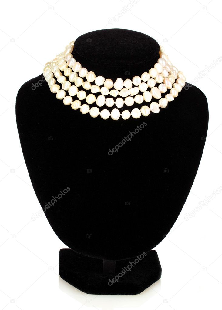Pearl necklace on a mannequin isolated on white