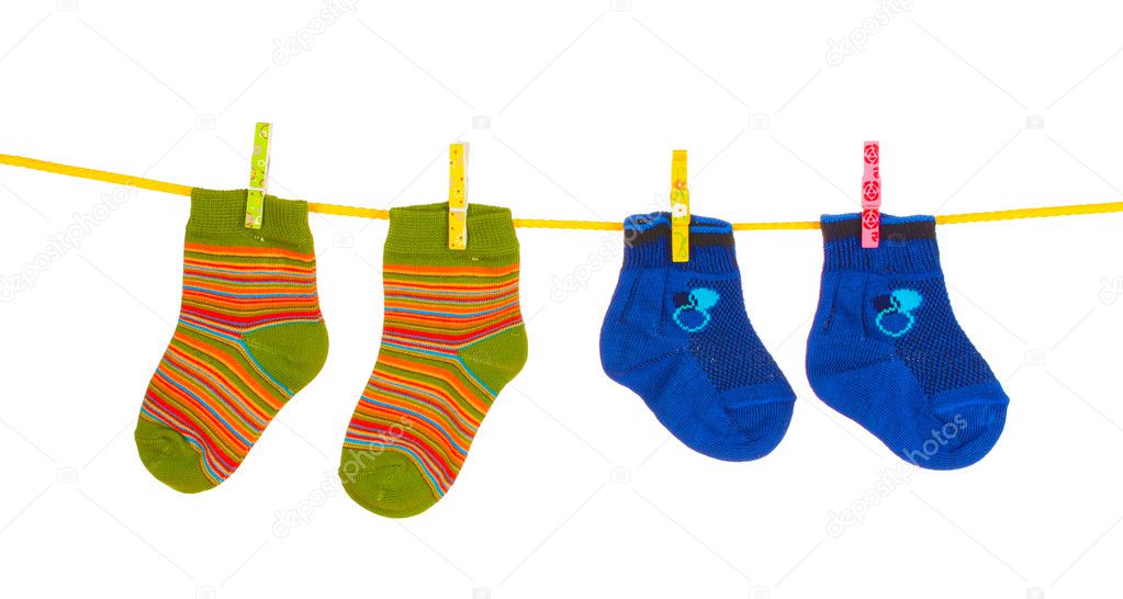 Children's bright socks on line isolated on white