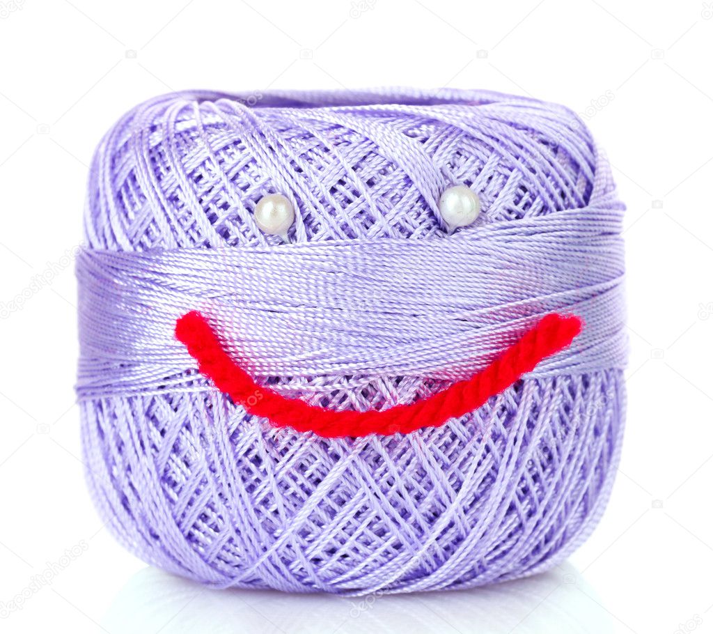 Thread bobbin with smile isolated white