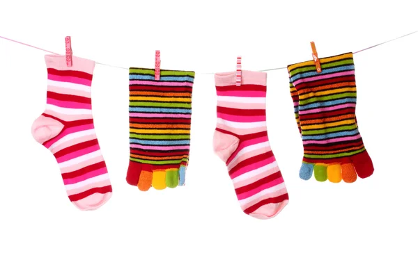 Ponožky visí izolované na bílém — Stock fotografie