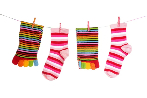 Socks hanging isolated on white — Stock Photo, Image
