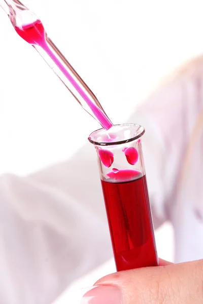 Hand holding blood in test tube close up — Stock Photo, Image