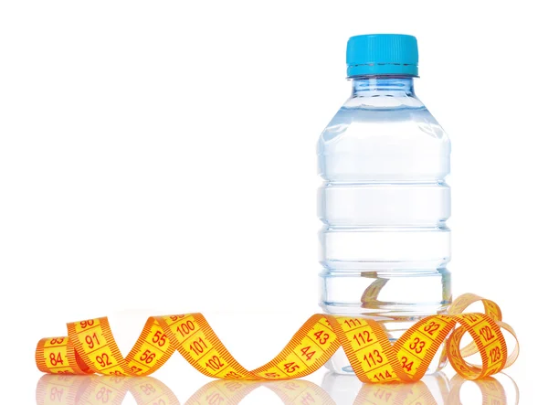 Gele tape maatregel en water fles — Stockfoto