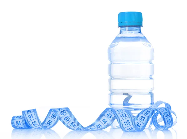 Modré Svinovací metr a láhev s vodou — Stock fotografie