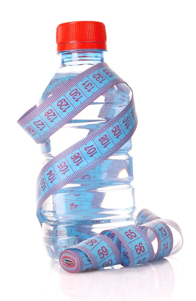 Fita métrica azul e garrafa de água — Fotografia de Stock