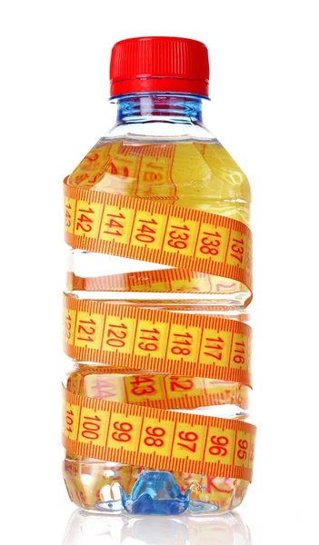 Sárga mérőszalag és a vizes palack — Stock Fotó