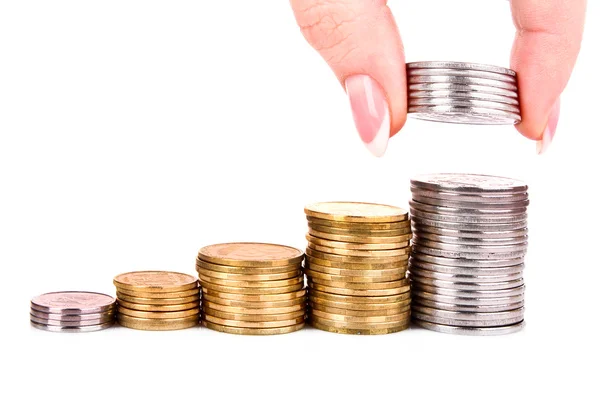 Someone add coin to coin tower — Stock Photo, Image