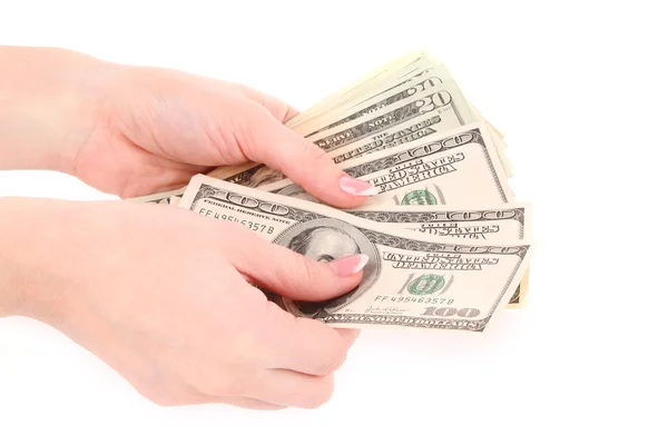 Dólares americanos en una mano sobre fondo blanco — Foto de Stock
