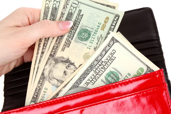 Красный кошелек с долларами в руках на белом фоне — стоковое фото
