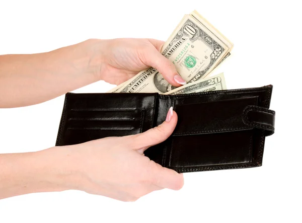 Красный кошелек с долларами в руках на белом фоне — стоковое фото